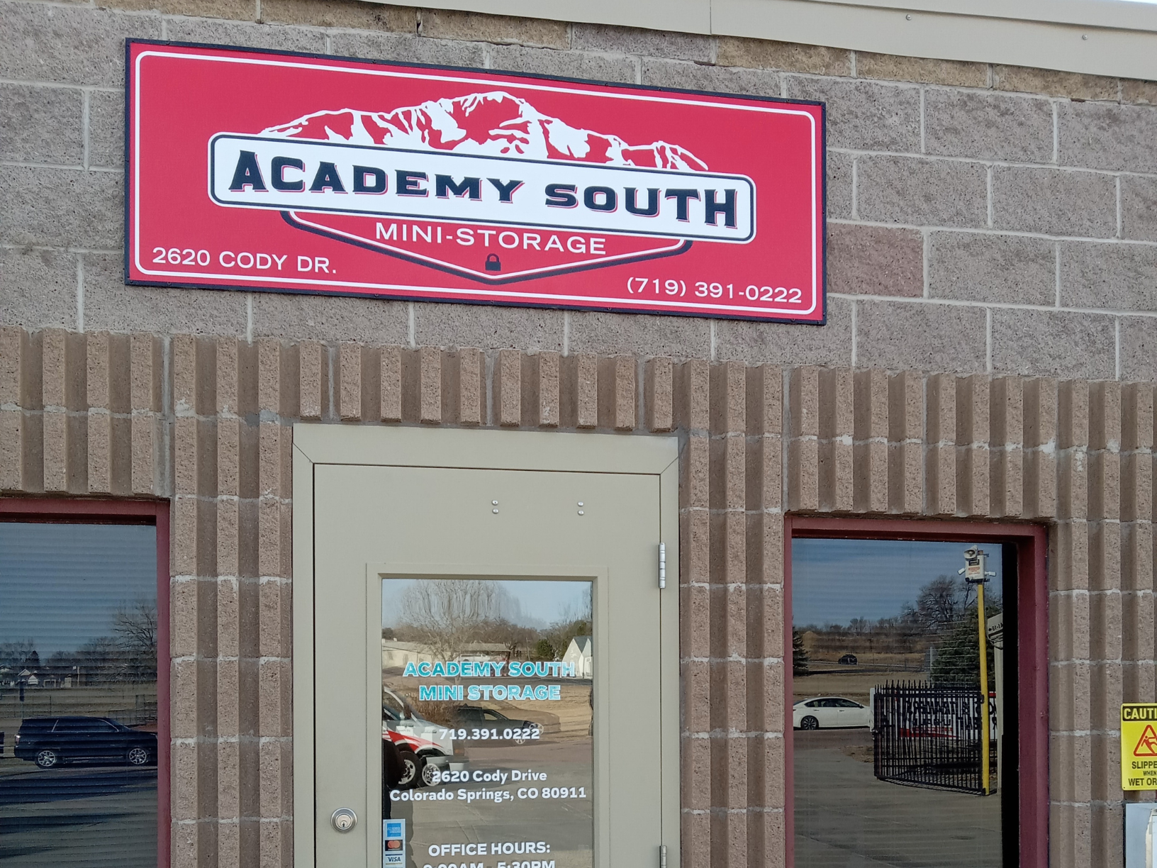 Academy South Sign on Fence Secure Storage